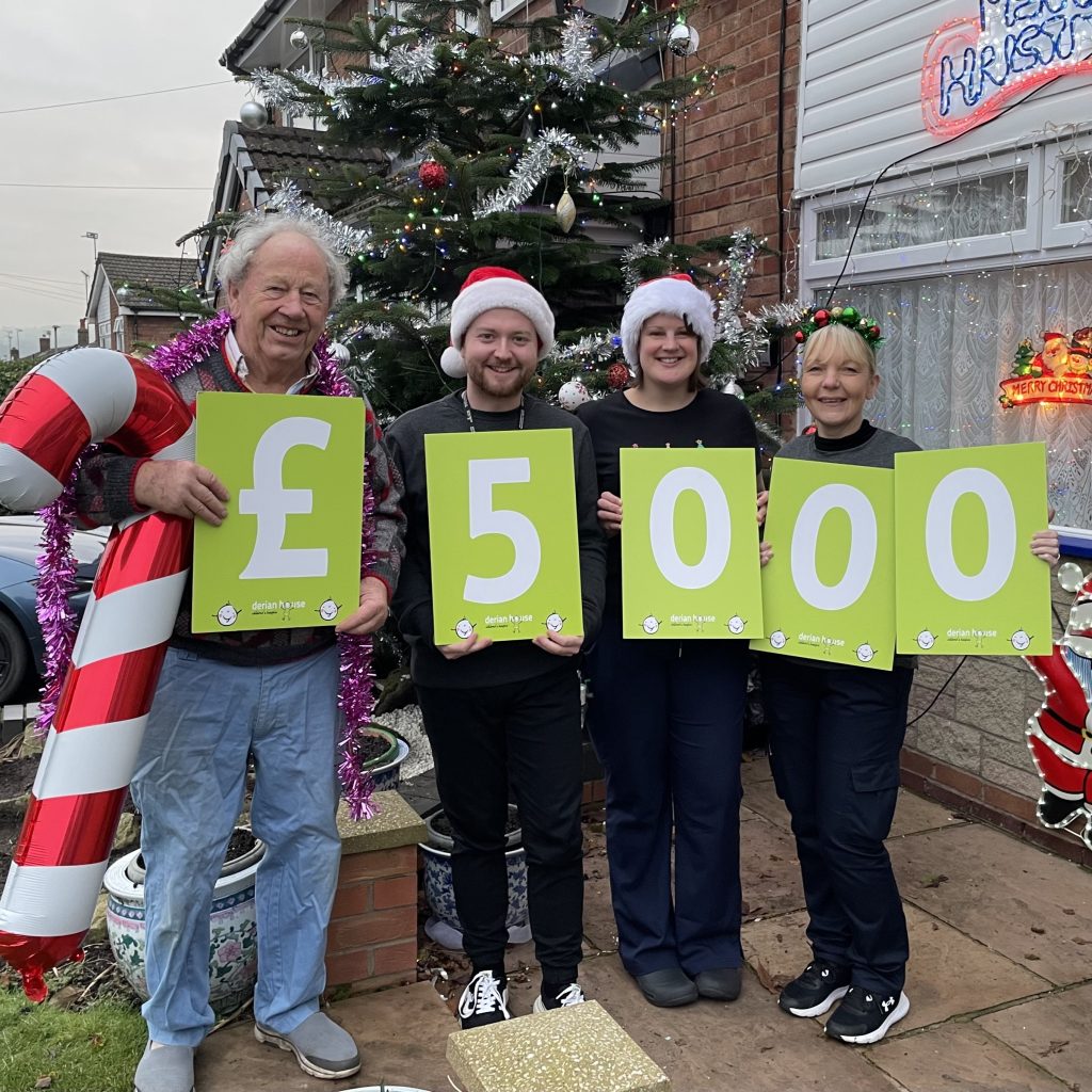 Greater Manchester couple win £5,000 on Derian House’s Christmas Raffle